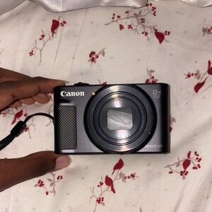 Canon Black Camera with Pink Case